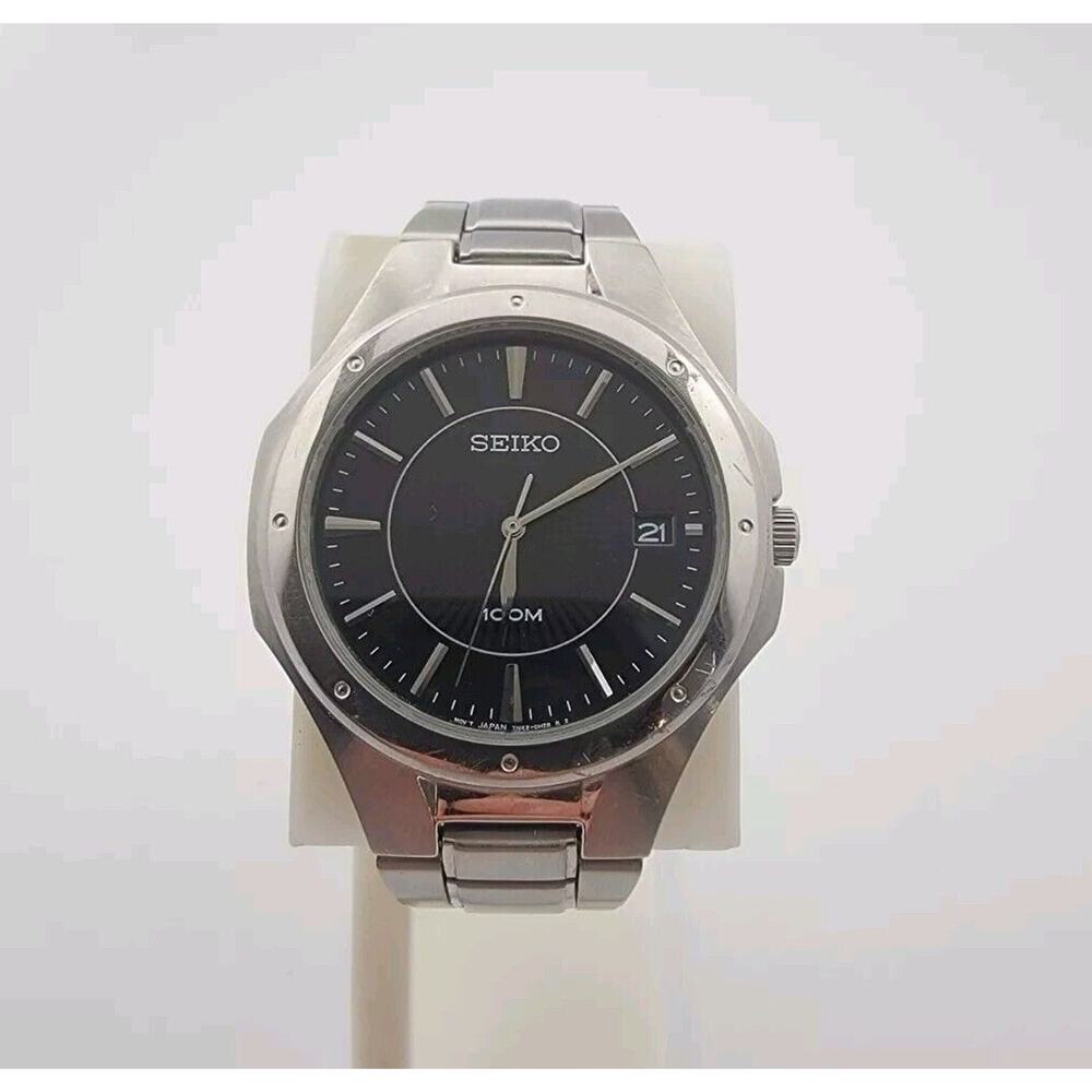 Men's Seiko 7N42-0FD0 Stainless Steel Calendar Vintage Quartz Watch 6.75" wrist-